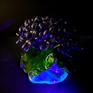 Mid Century  lucite purple violet flowers on a  lucite glowy base
